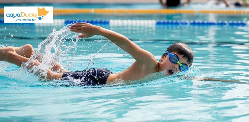 Child performing full freestyle stroke with coordinated arms, legs, and breathing near water surface