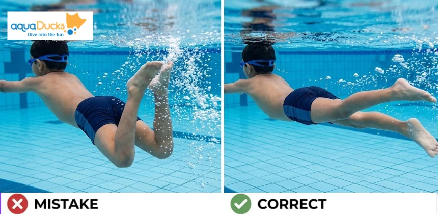 A young swimmer practicing the correct technique by kicking from the hips instead of bending knees in the pool