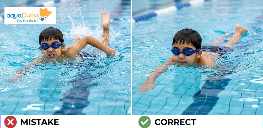 A young swimmer focusing on slow and controlled arm movements to improve swimming technique instead of rushing