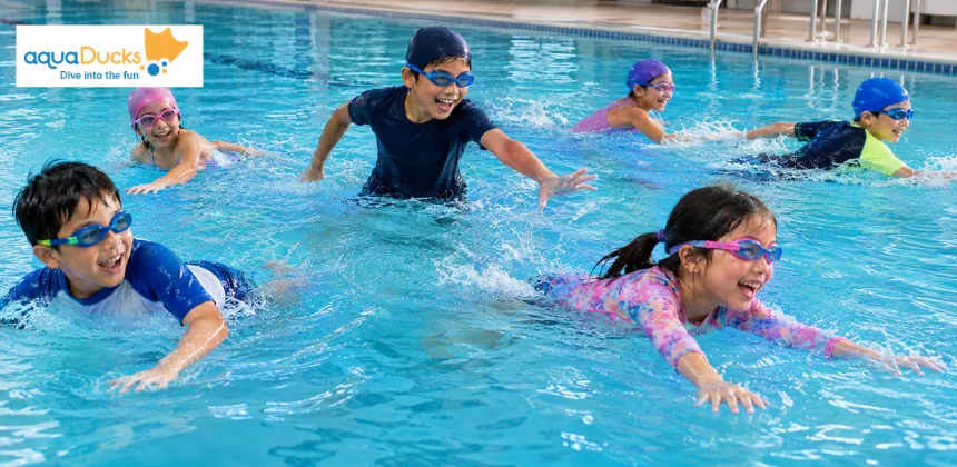 Kids playing Sharks and Minnows among popular swimming games for kids, racing fast in thrilling swimming race games together.